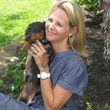 Critter Watch Pet Sitting owner with client's dog